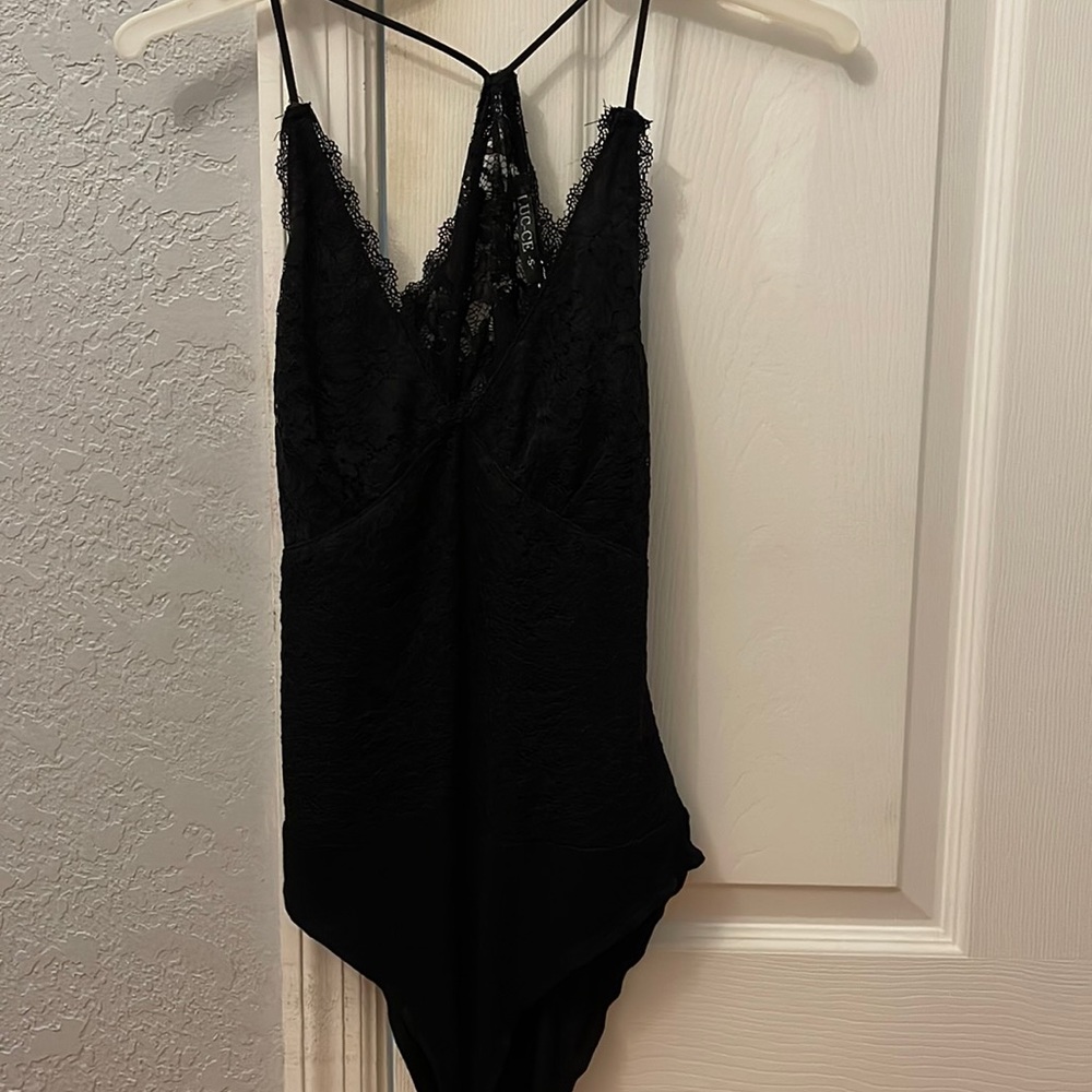 Lace body suit cut out back